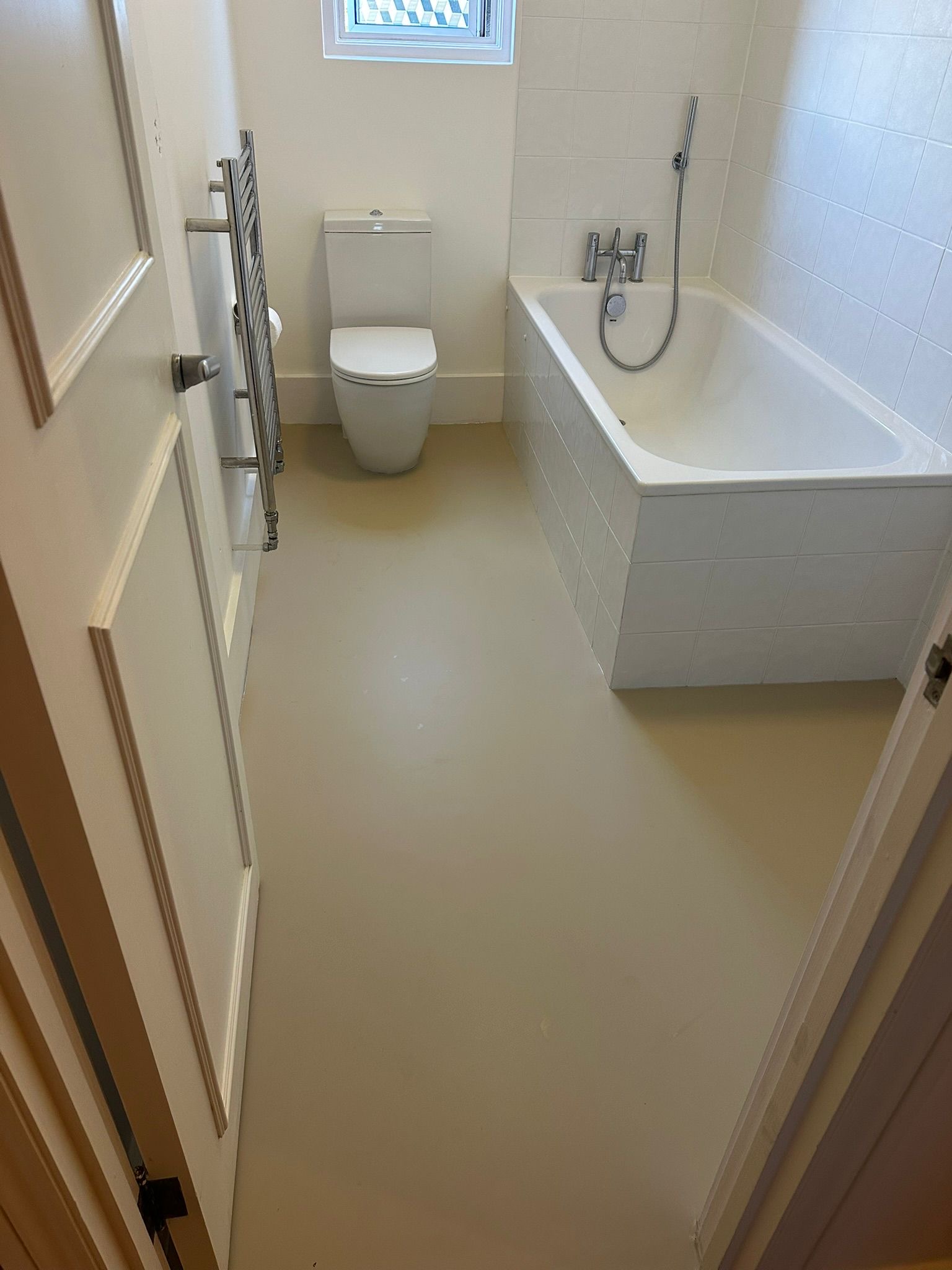 Cream Colour Flooring installed in a bathroom
