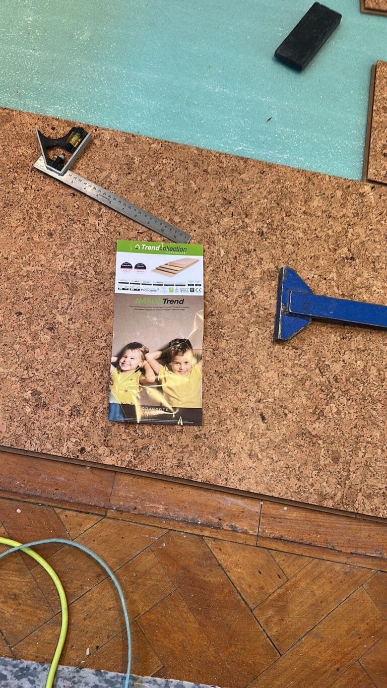 Cork tiles set out and cut ready to lay