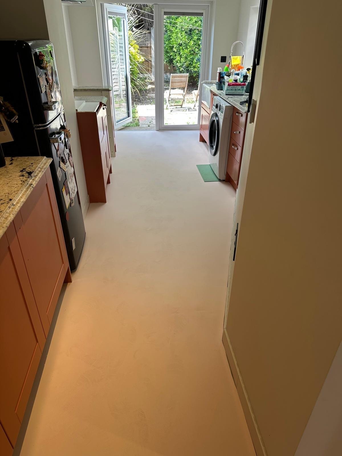 Colour Flooring being laid in the kitchen