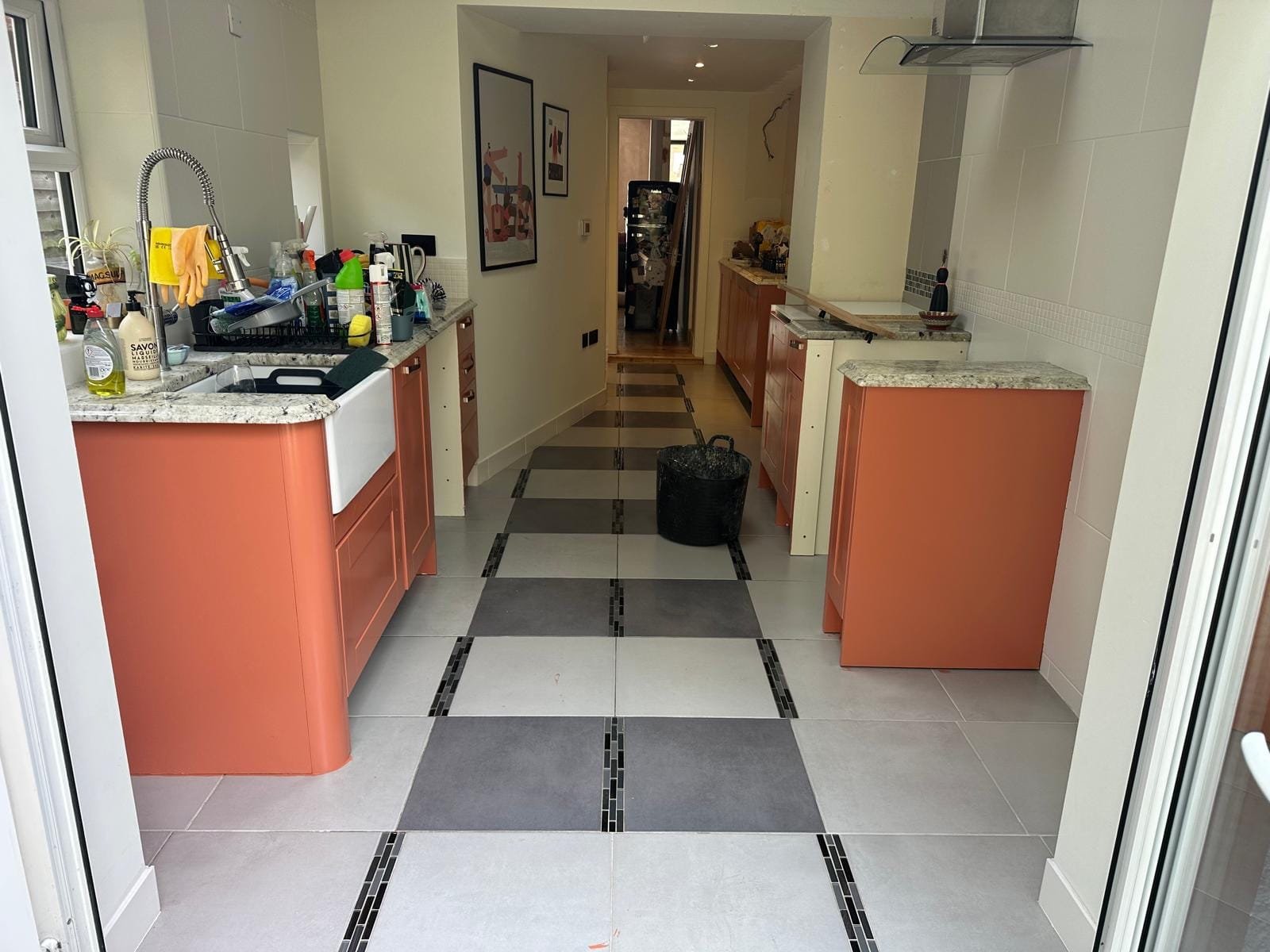 Existing ceramic tile kitchen floor before flooring