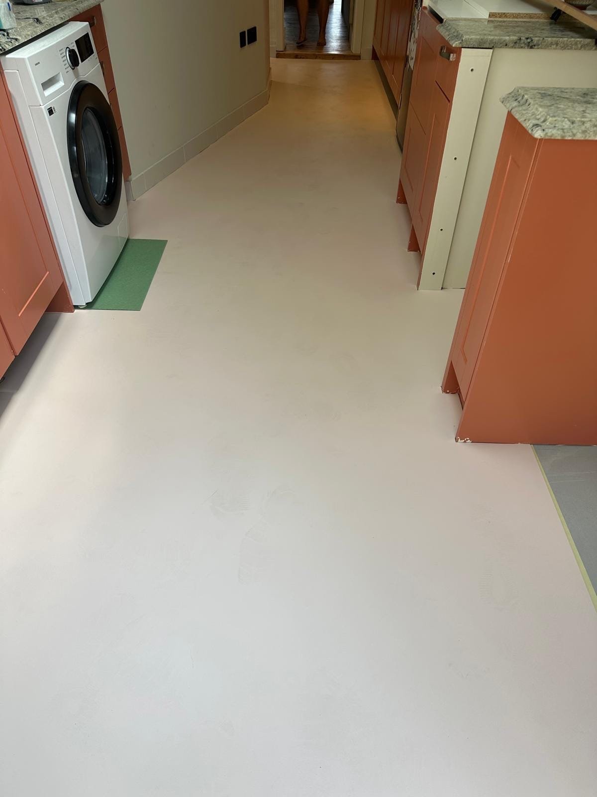 New Colour Flooring laid throughout a kitchen in Leytonstone