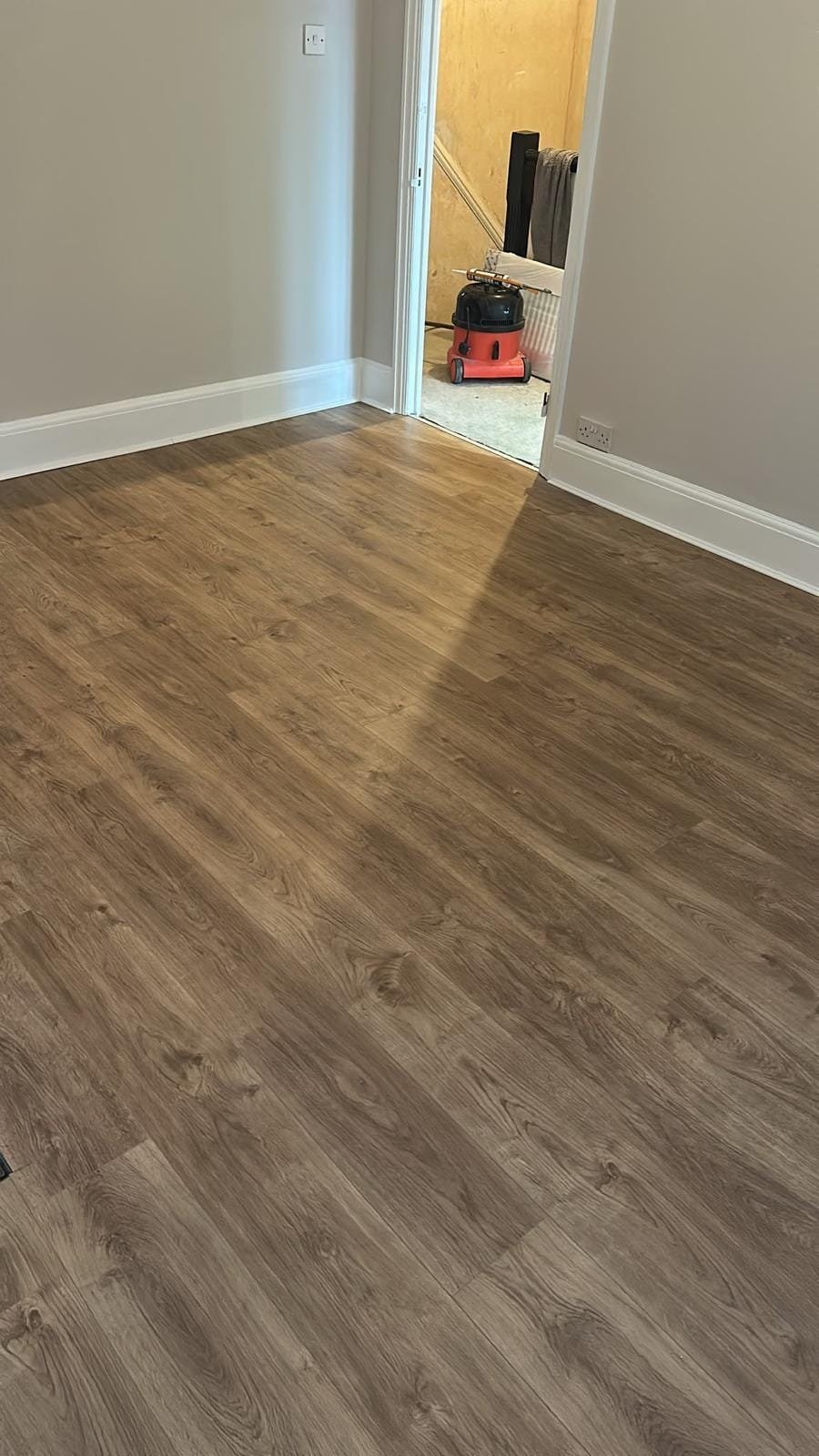 Completed living-room laminate floor in Wandsworth