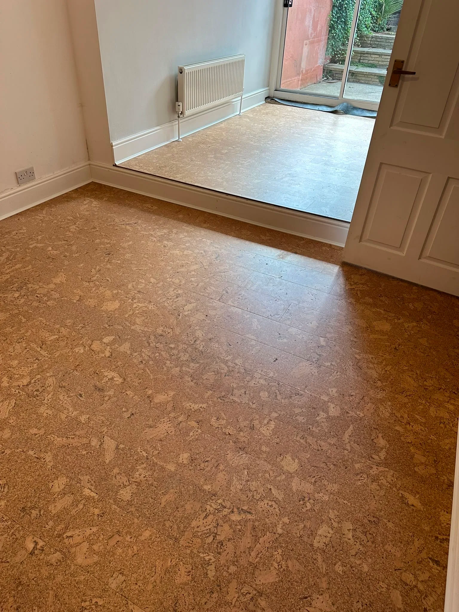 Finished cork plank flooring in a kitchen we fitted