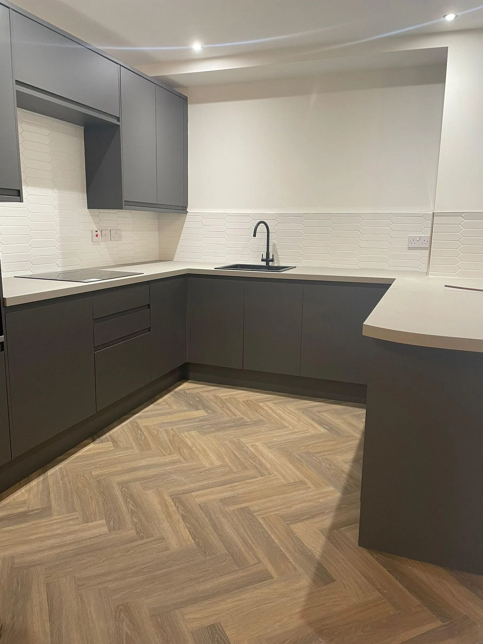 Karndean parquet LVT supplied and fitted in a graphite kitchen